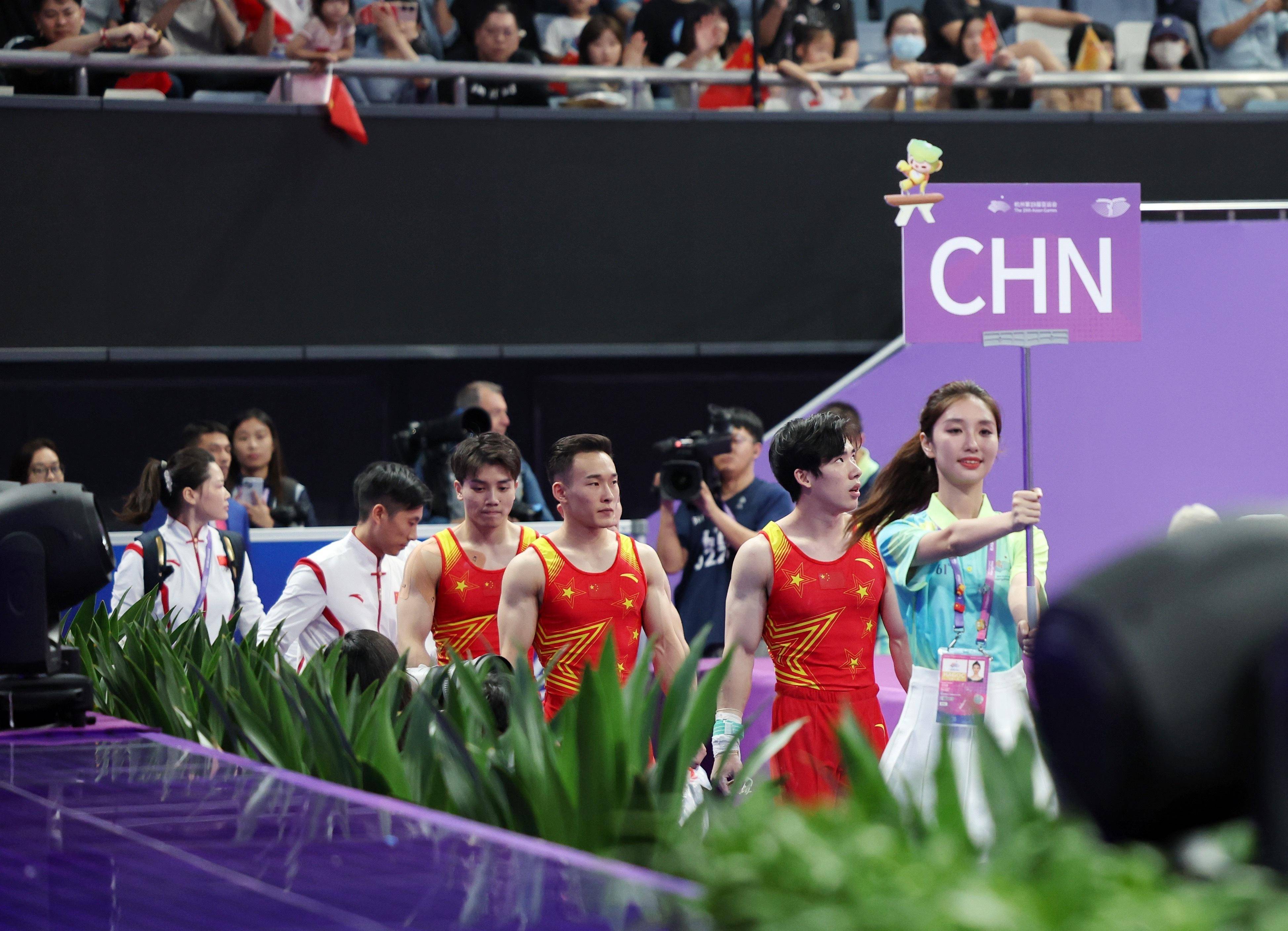 包含体操比赛中，美国队表现亮眼夺得团体项目冠军的词条